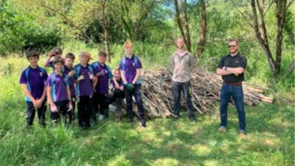 Students build otter habitat out of recycled flood defence